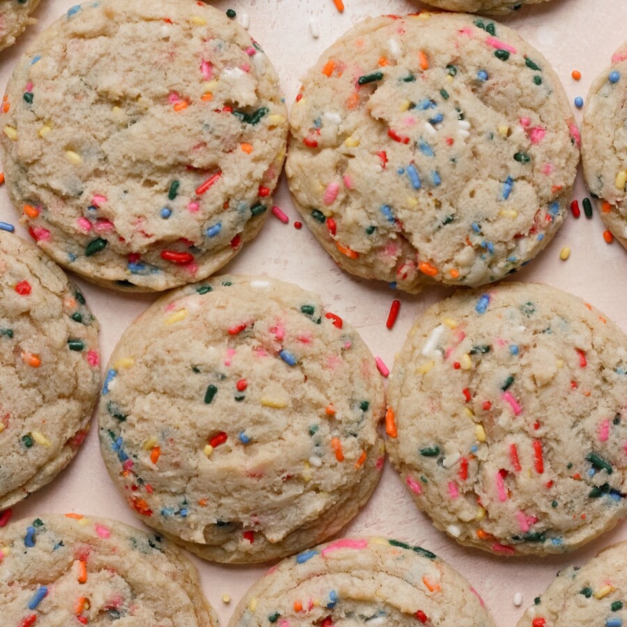 Confetti cookies on a pink backdrop