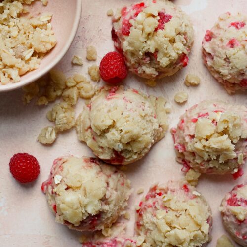 Raspberry muffin cookies on a pink backdrop