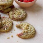 Raspberry muffin cookies on a pink backdrop