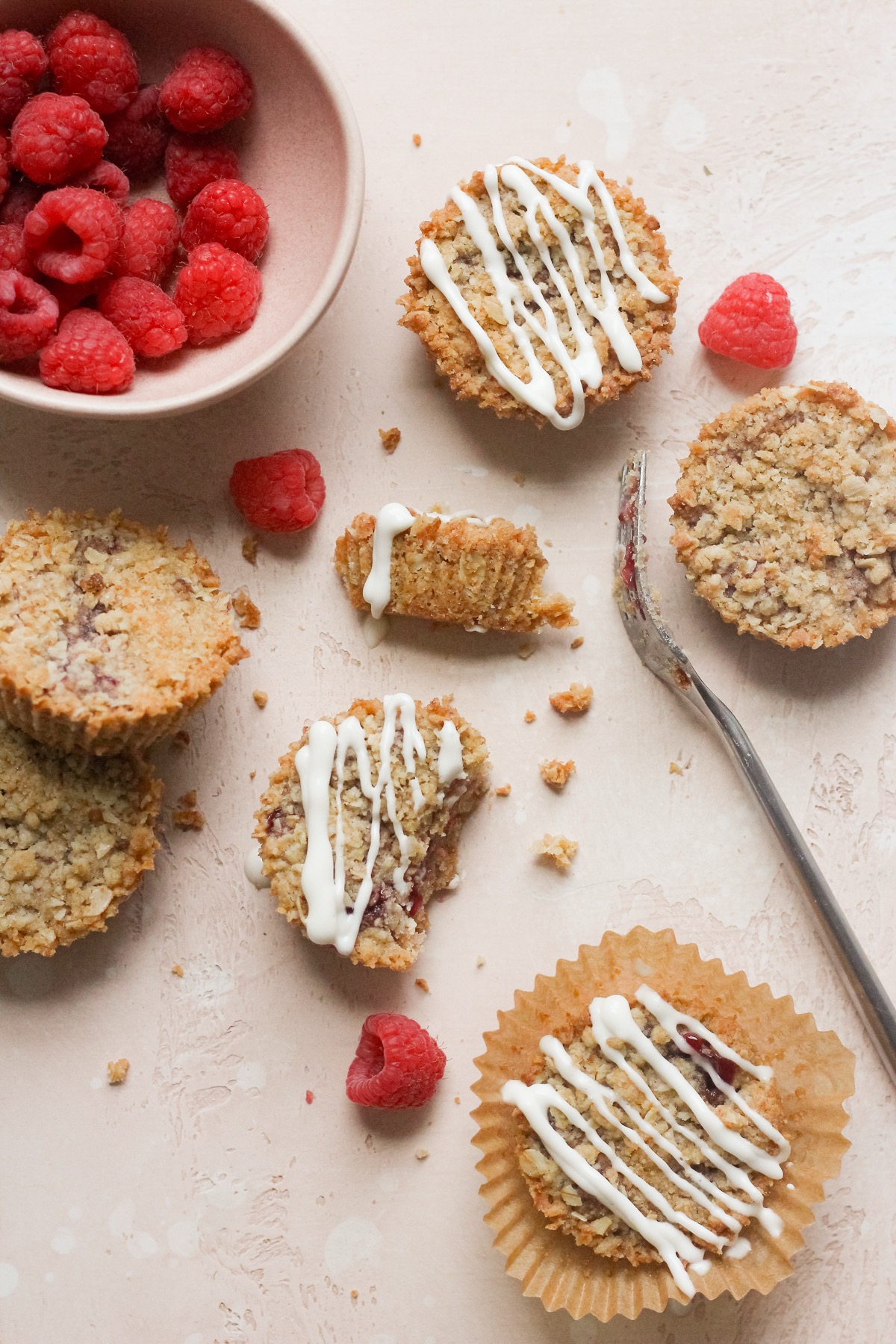 Raspberry cookie cups on a pink backdrop