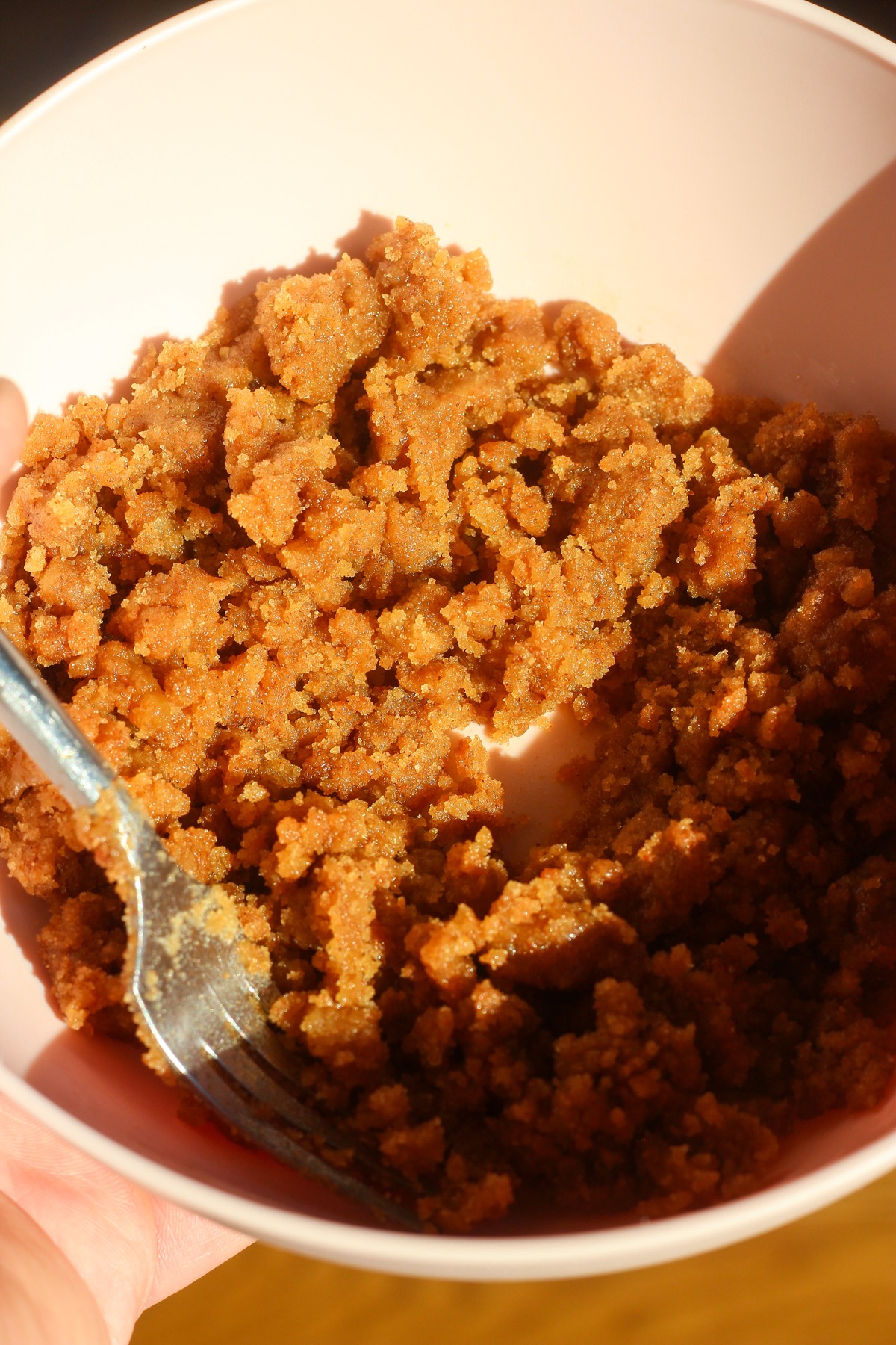 Cinnamon swirl mixture in a pink bowl.