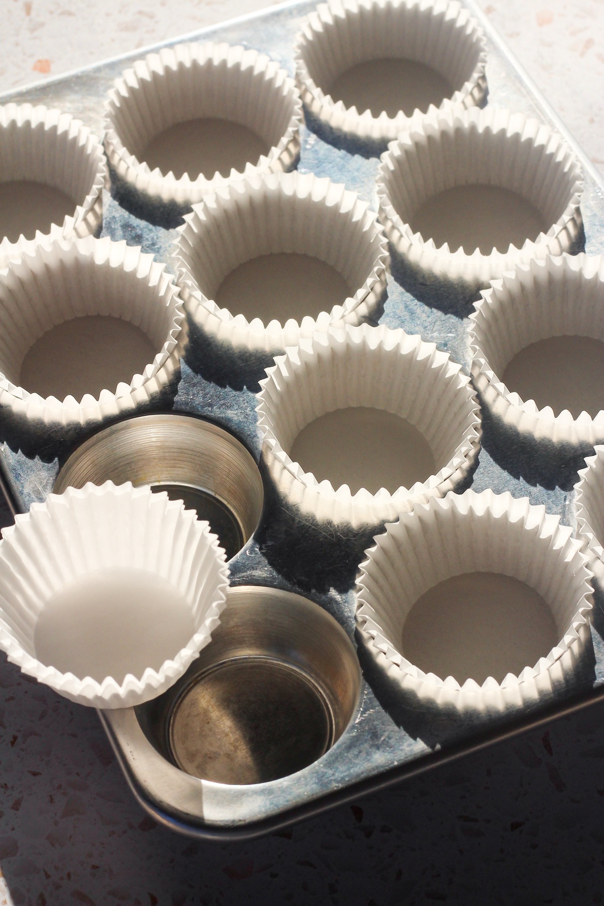 Cupcake liners in a muffin pan.